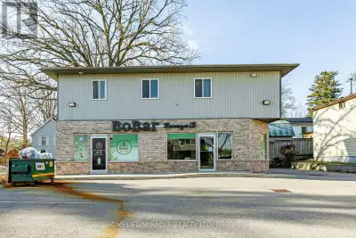 Fantastic investment opportunity! Well-maintained mixed-use property featuring commercial space on t...