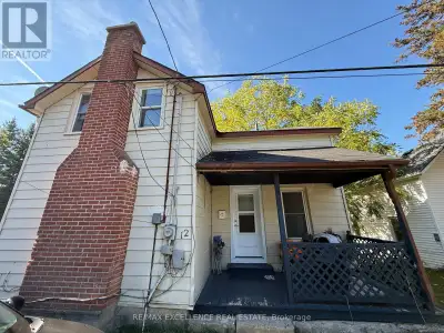 Welcome to 12 Original Road. CORNER LOT situated on a large, irregular lot across from the Napanee G...