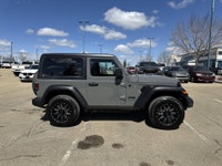 This Jeep Wrangler delivers a Gas/Electric V-6 3.6 L/220 engine powering this Automatic transmission... (image 7)
