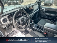 The striking Anvil exterior of this 2024 Jeep Wrangler Sport S Convertible sets it apart, a fresh tr... (image 9)