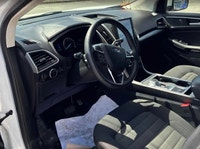 Command every journey in this pristine white 2024 Ford Edge SEL, boasting a sophisticated All-Wheel... (image 4)
