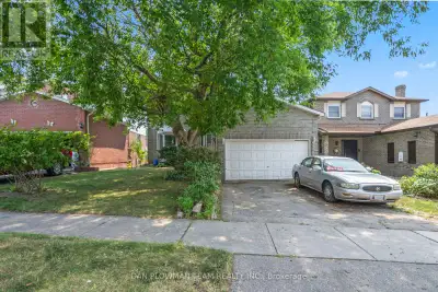 Spacious 2-Story Home With 3+1 Bedrooms, 2.5 Baths, Walk-Out Basement, Two Kitchens And A Double Car...