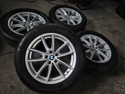 Very clean set of original BMW X3 BMW X4 wheels with TPMS and mounted on Continental winter tires go...