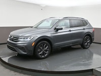 Volkswagen's Tiguan is a European take on an American classicâ€”the SUV. It offers more athletic han... (image 2)