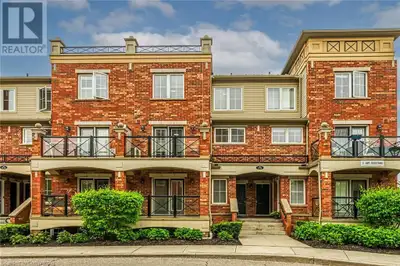 Beautifully Updated 2-Bedroom Stacked Townhome in the Heart of Oak Park. Welcome to this freshly pai...