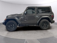 Get ready to command attention with the 2026 Jeep Wrangler Sport, a true symbol of adventure and rug... (image 1)