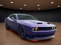 The 2023 Dodge Challenger SRT Hellcat Jailbreak in a stunning purple hue captivates with its rear-wh... (image 3)