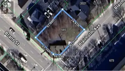 Seize the chance to own a prime corner lot located on one of Burlington's busiest streets! This high...