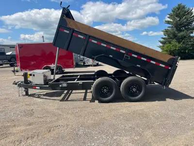 ACTION SERIES 7' X 12' DUMP TRAILER WITH 7 TON GVWR, WOOD EXTENSIONS AND TARP KIT! Crafted with prec...