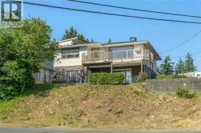 Perched just above the heart of downtown Campbell River, this 4 bedroom, 2 bathroom home is packed w...