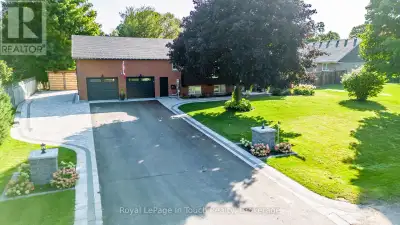 Finished To Perfection! This Beautiful 4-Bedroom, 3-Bathroom Raised Bungalow Has Been Gorgeously Upd...