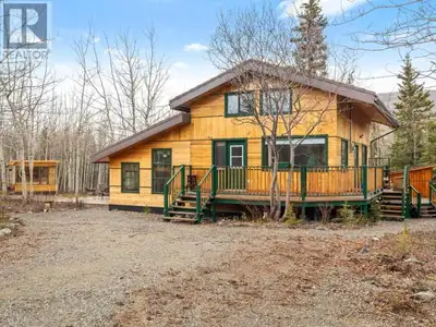 Tucked away on 5.6 acres in Grizzly Valley South, this charming chalet-style home and massive 32' x...