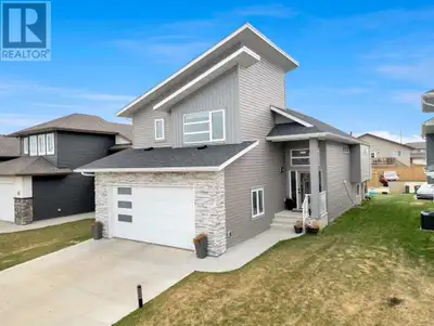 Welcome to this beautifully upgraded bi-level home in a prime South East Lacombe location, built by...