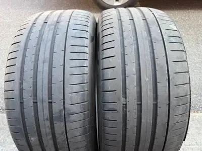 a Nice PAIR of High performance Pirelli tires in awesome shape with good tread (2 TIRES ONLY) size 2...