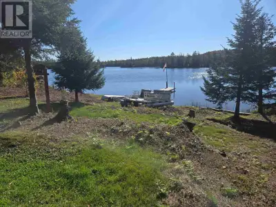 Looking to own your private slice of paradise on Spruce Lake off-grid? Then this leased land propert...