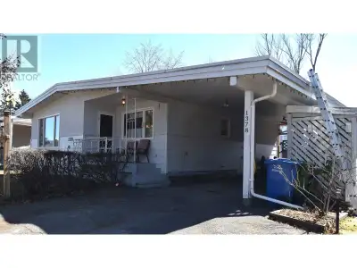 * PREC - Personal Real Estate Corporation. This inviting bungalow has a spacious layout with 4 bdms,...