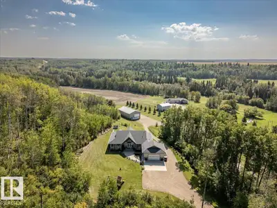 This Immaculate 8.01 acre property holds a Beautiful 1833 sq/ft home, a fully finished 40'x70' Shop...