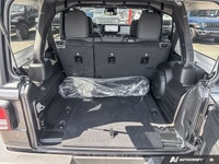 This Jeep Wrangler boasts a Regular Unleaded V-6 3.6 L/220 engine powering this Automatic transmissi... (image 8)
