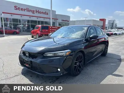 Engineered for both spirited drives and practical versatility, the 2023 Honda Civic Hatchback Sport...
