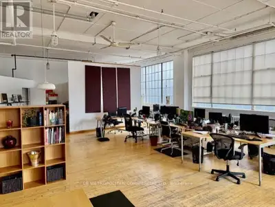 Open column free studio/office, with wood floor and large industrial windows facing east and south.....