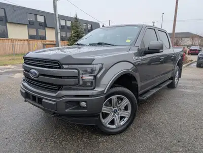 Get behind the wheel of the rugged and reliable 2019 Ford F-150 Lariat, finished in a stylish gray w...