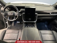 The 2025 GMC Yukon XL Elevation 4WD blends extended-length versatility with bold, monochromatic styl... (image 9)