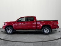 Check out this rugged and dependable 2016 Toyota Tacoma Double Cab! This accident free Ontario vehic... (image 2)