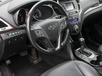 Introducing the 2022 Buick Encore Preferred AWD, a striking black SUV that combines all-wheel drive... (image 9)