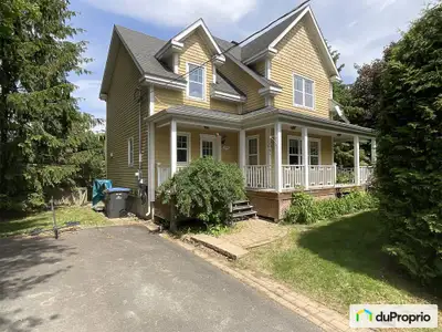 Traduction automatique Nichée dans un cadre vraiment exceptionnel à Saint-Jean-sur-Richelieu/Île Sai...