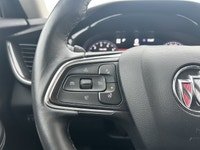 The 2023 Buick Envision Essence, presented in a sophisticated Gray finish, masterfully blends luxuri... (image 8)