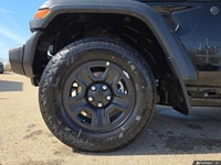 This Jeep Wrangler has a strong Regular Unleaded V-6 3.6 L/220 engine powering this Manual transmiss... (image 5)