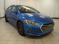 Finished in a confident Blue exterior with a clean Black interior, this pre-owned 2018 Hyundai Elant... (image 1)