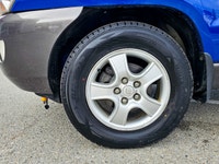 Experience the reliable and versatile 2007 Kia Sportage in a stunning blue finish with front-wheel d... (image 4)