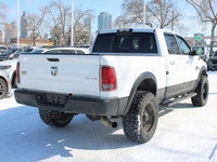 This 2014 Ram 3500 Longhorn is a local trade-in with two keys and lom km's, under the hood sits the... (image 9)