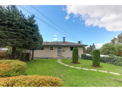 Tidy property on the Trucking-Banned River road! This 4-bedroom, 2-bath, 2-kitchen, 2-level home was...