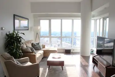 Beautiful, two bedroom, two bathroom corner unit on the penthouse floor. Located centrally, this sui...