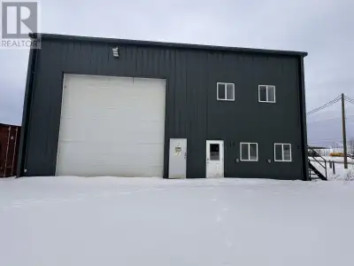 Situated on 2.47 acres, this industrial property features a spacious main building designed for vers...