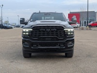 The 2026 Ram 2500 Limited Mega Cab Night Edition in Diamond Black Crystal Pearl delivers bold stylin... (image 9)