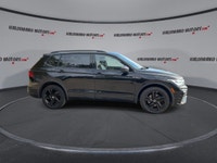 This Volkswagen Tiguan has a strong Turbo Gas 4cyl 2.0 L engine powering this Automatic transmission... (image 8)