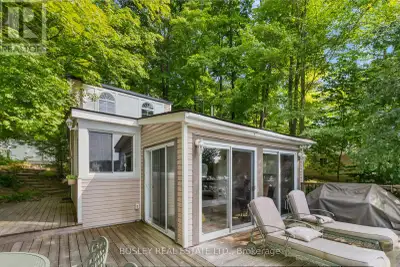 Move right in to this renovated 3 bedroom cottage with the coveted west facing view over the lake. E...