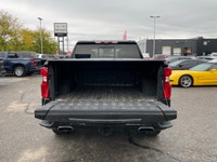 The 2023 Chevrolet Silverado 1500 High Country is an impressive black 4x4 truck that combines power... (image 4)
