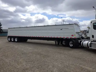 Welcome to Andy's Truck Sales. USED 2025 NEVILLE BUILT 48' STEEL TRI-AXLE ,2 HOPPER GRAIN TRAILER #1...