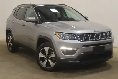 Experience adventure with the 2018 Jeep Compass North 4x4, showcased in a sophisticated gray exterio...