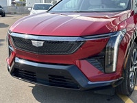 AMVIC Licensed Dealer Introducing the First-Ever 2025 Cadillac Optiq EV Sport 1 AWD in Radiant Red T... (image 2)