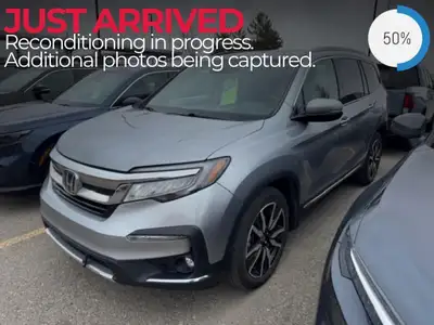 Experience the perfect blend of style and versatility with the 2020 Honda Pilot Touring 7-Passenger...