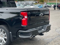 The 2023 Chevrolet Silverado 1500 High Country is an impressive black 4x4 truck that combines power... (image 3)
