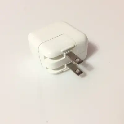 Apple 10W USB Power Adapter. ing5 This adapter is designed to charge Apple devices like iPhones, iPa...