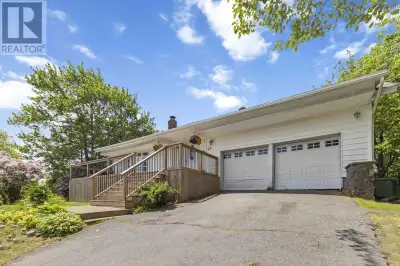 Welcome to 98 Wildwood Blvd, this beautifully kept home sits on a private, landscaped 15,000ft lot....
