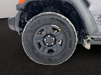 This 2026 JEEP WRANGLER 2-DOOR SPORT has the following options Cloth Low-Back Bucket Seats, Uconnect... (image 8)