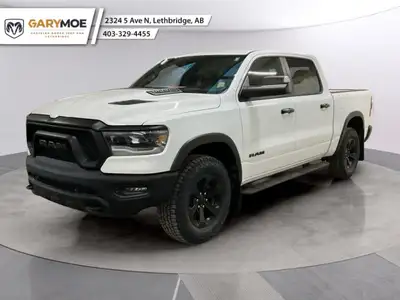The 2023 Ram 1500 Rebel is here to make a statement. Coated in a striking white finish and boasting...